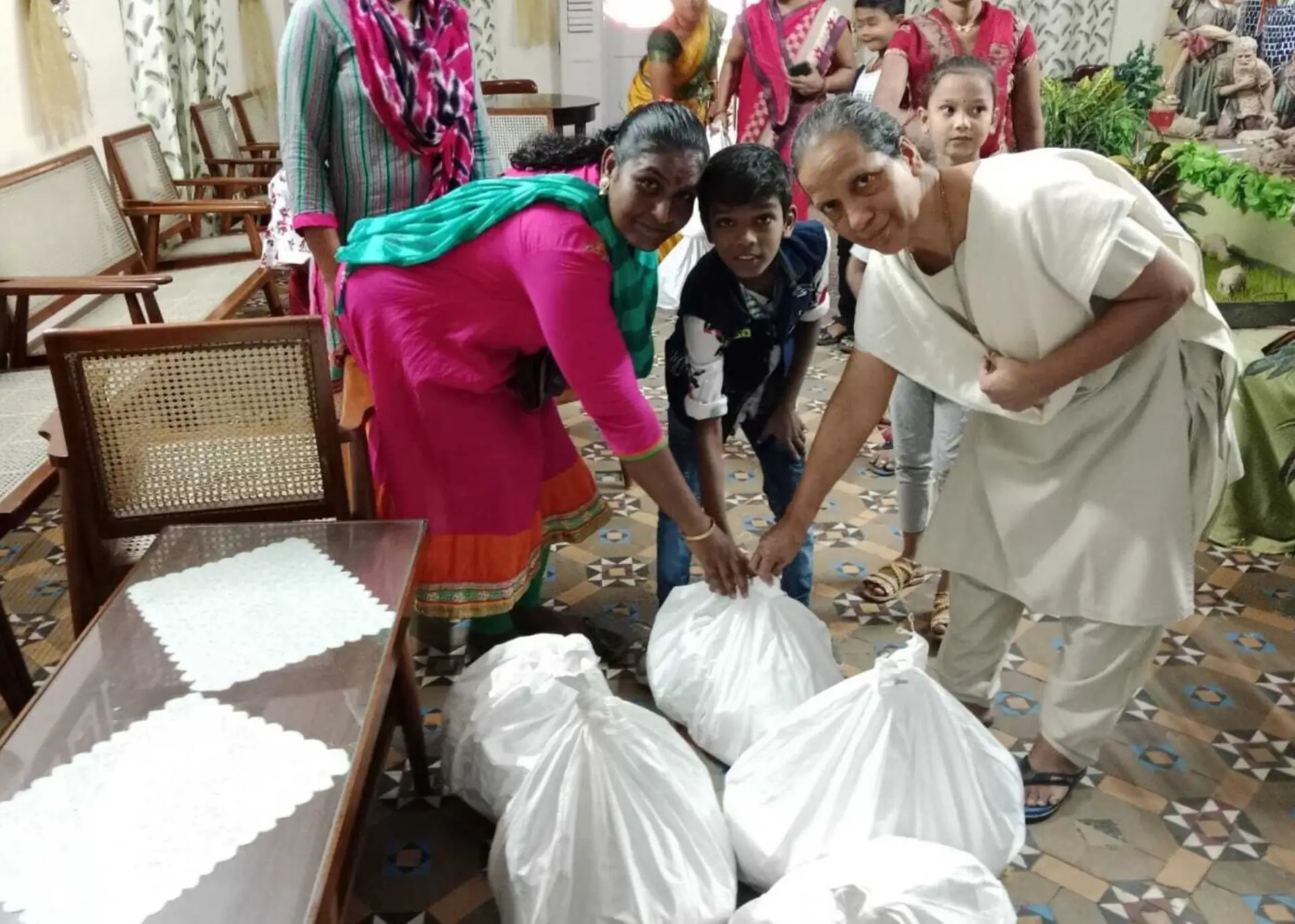 Distributing hampers to the poor