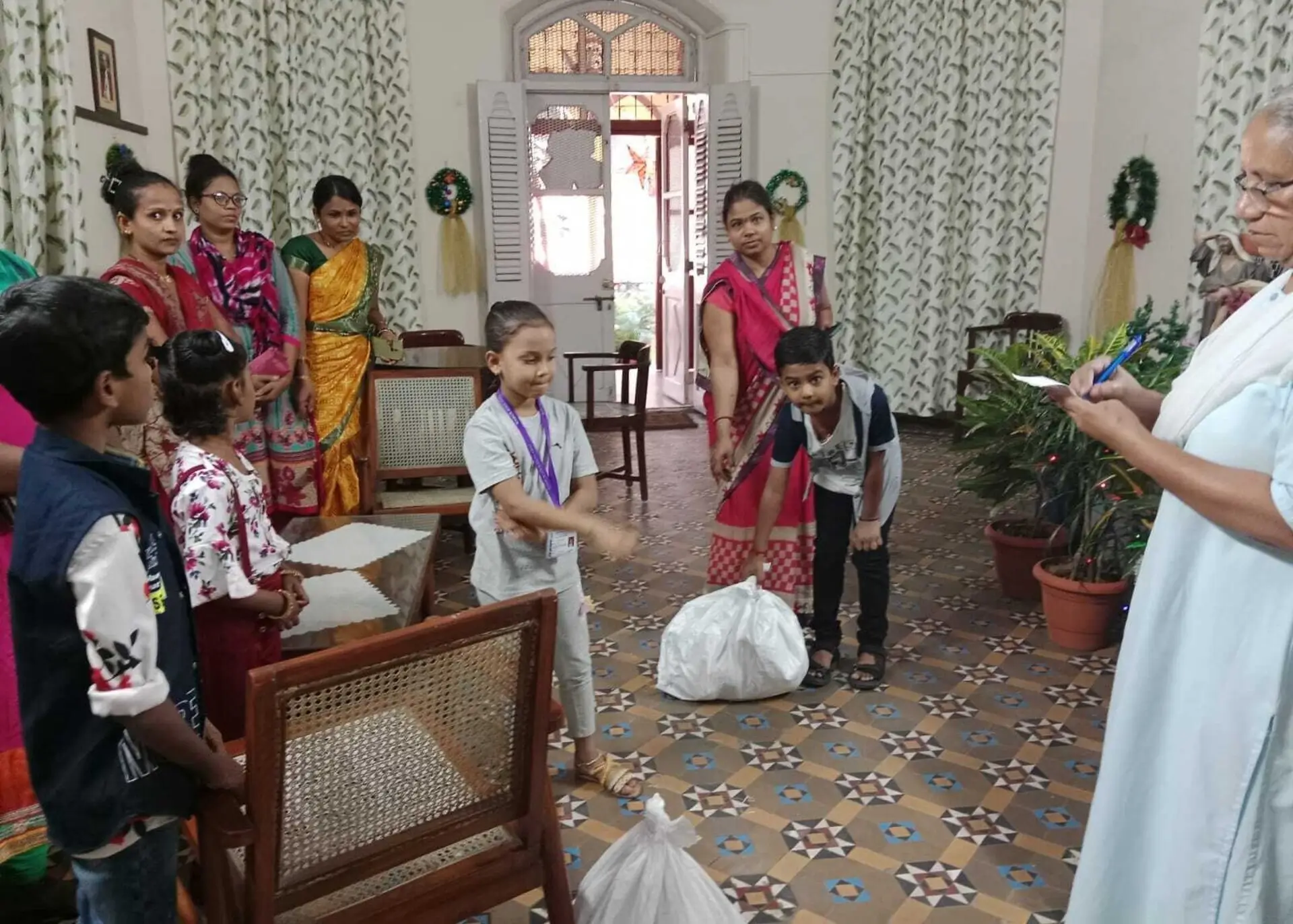 Distributing hampers to the poor